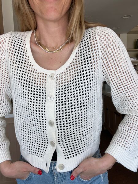 Into this crochet scoop neck cardigan from Target. Showing here with a bathing suit under but you could do a tank or body suit…also comes in black. Great Spring break piece! Runs tts. Laura wearing a small. 

#LTKswim #LTKover40 #LTKfindsunder50