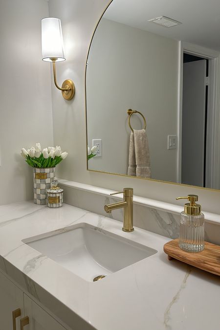 Bathroom Vanity decor, mirror, wall sconces, Mckenzie Child’s vase & canister, & faux tulips  

#LTKstyletip #LTKhome