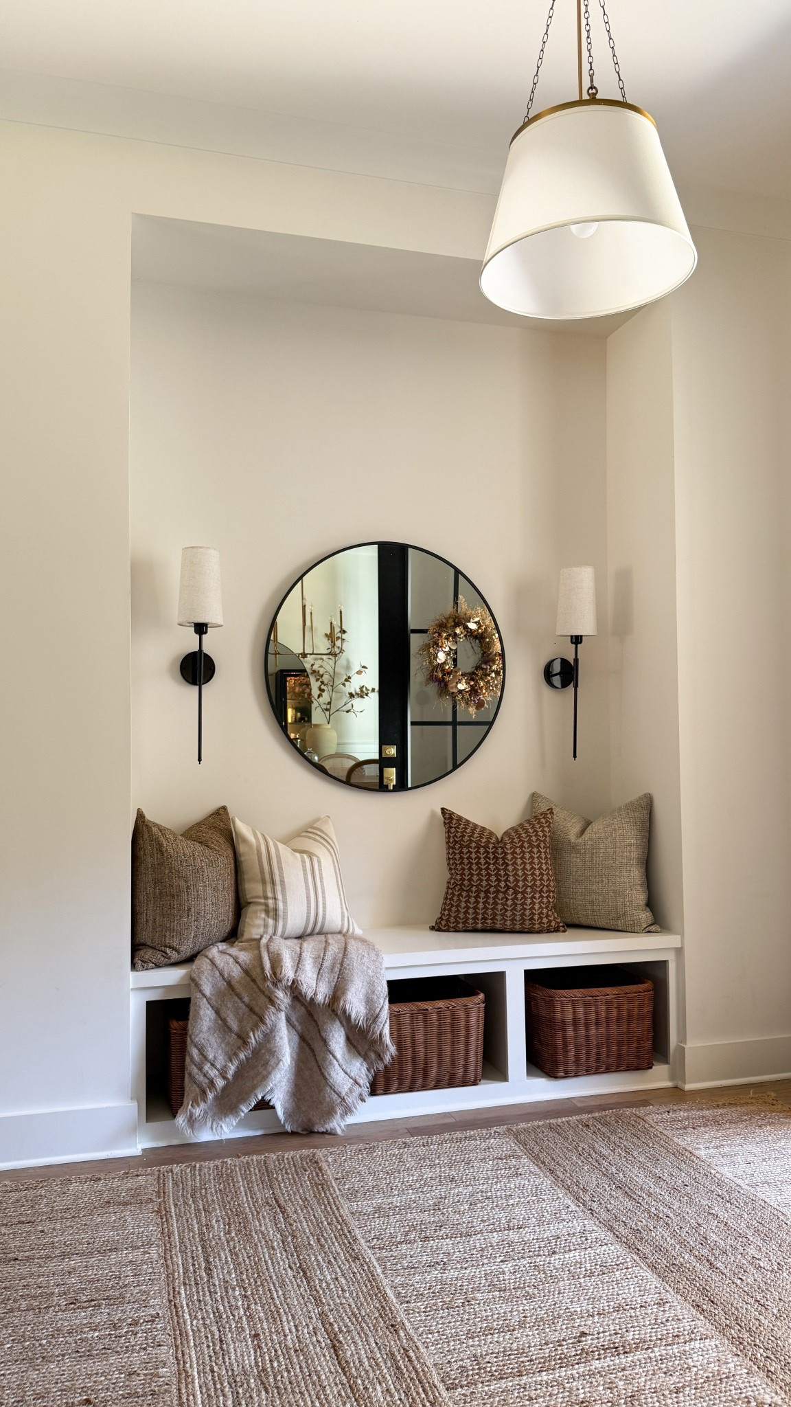 I love this modern cozy nook in our front entrance! The textures in the woven elements keep it cozy and inviting while the modern elements elevate it! 

#LTKStyleTip #LTKSeasonal #LTKHome