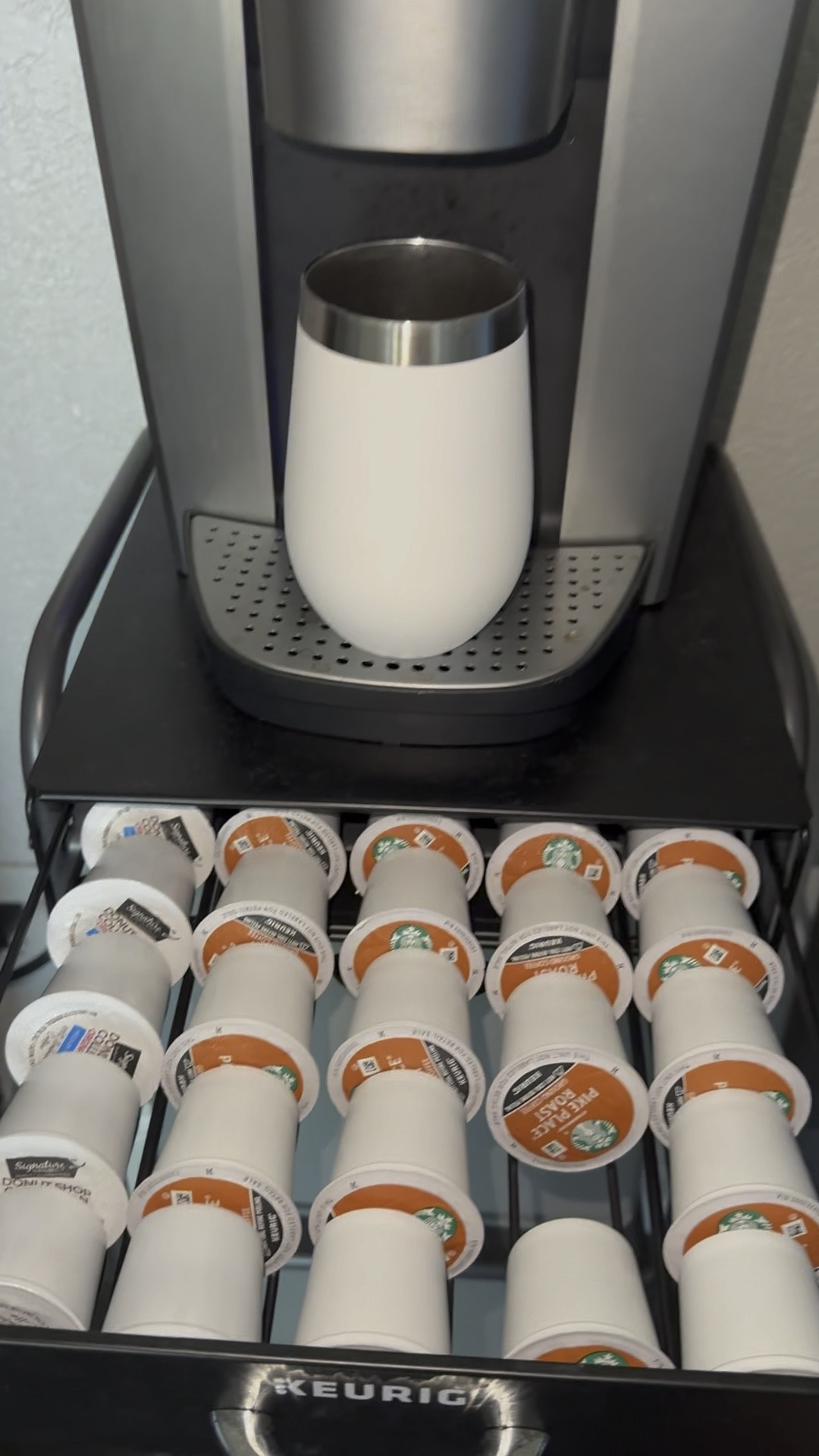 This K-Cup holder is perfect for condensed storage. I live in an apartment, so I try to maximize as much space as I possibly can. It fits perfectly under my Keurig machine and provides easy access to my favorite k-cups. I also like that you can see which flavor you are choosing! This one holds 35 cups, but they also have a smaller version that holds 24 ct.☕️

#LTKhome