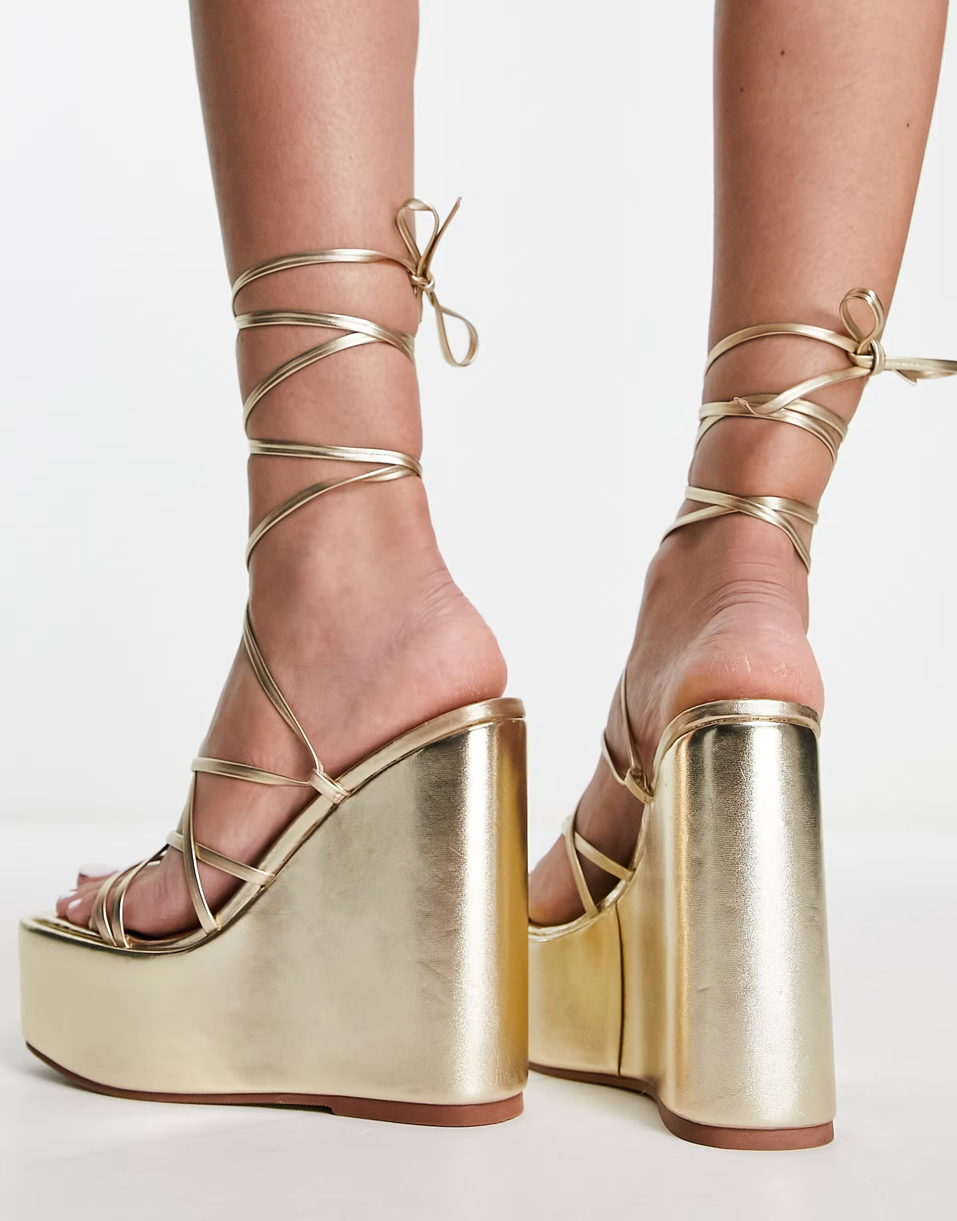 ASOS DESIGN Tanon tie leg wedges in gold | ASOS (Global)