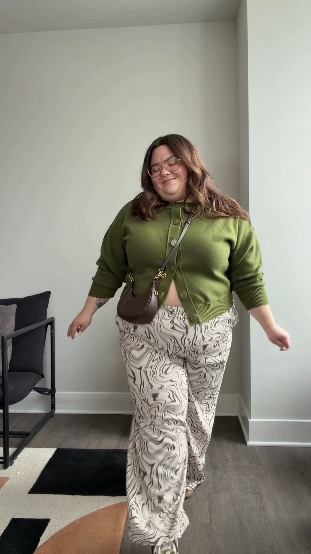 plus size outfit of the day (I’m 5’2 and a size 3X / 20)
- cardigan: rented from nuuly 
- pants: old Amazon the drop size 3X 
- purse: Coach
- sneakers: Dolce Vita 
- sweatpants: Garage size XL 
- bolero and tank top: Klassy size 3X

#LTKPlusSize #LTKMidsize #LTKgrwm