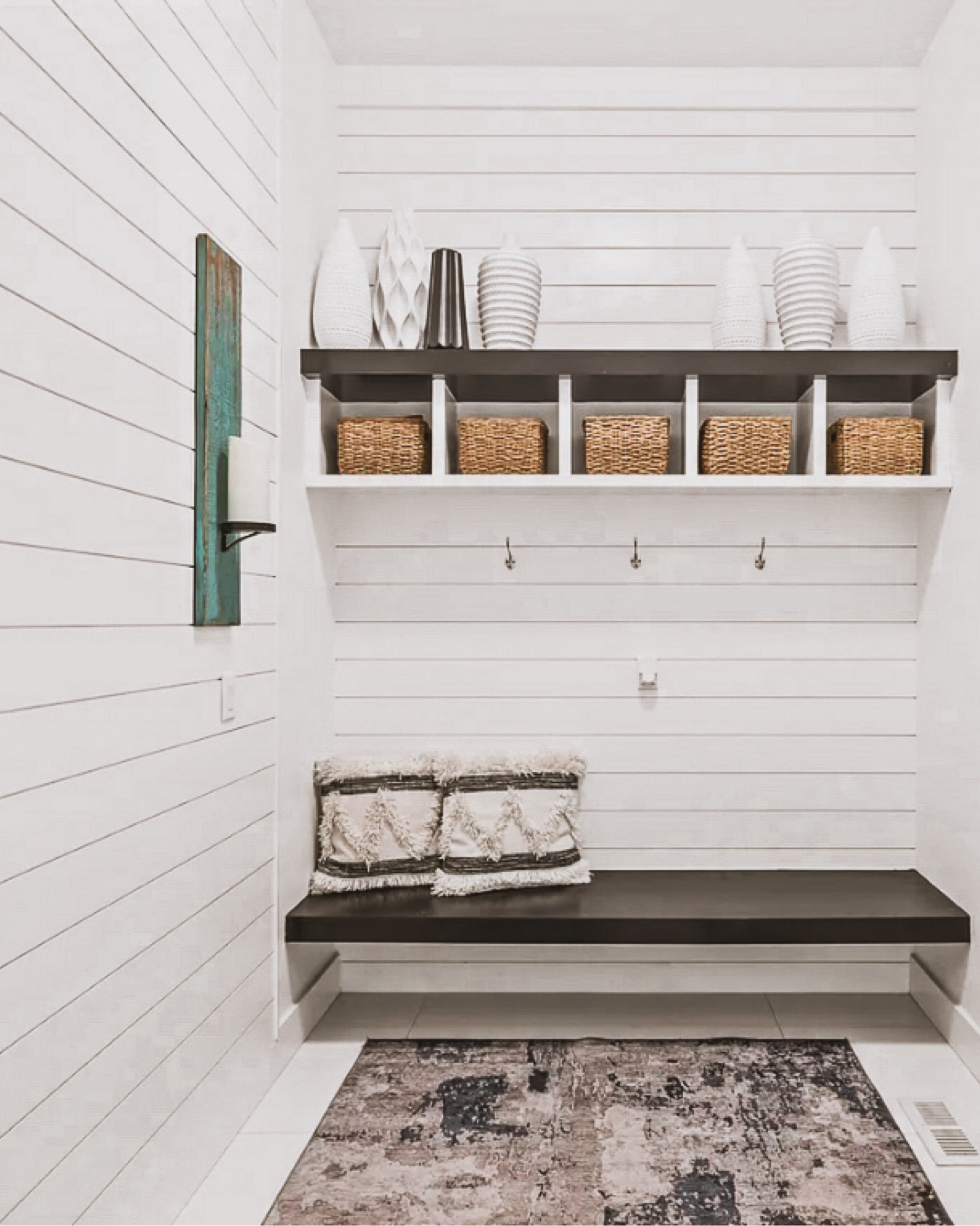 Love this sleek and functional mudroom space! Designed to streamline your entryway, this mudroom features ample storage solutions, stylish hooks, and a cozy bench to kick off your shoes after a long day. #OrganizedLiving #MudroomGoals

#LTKhome