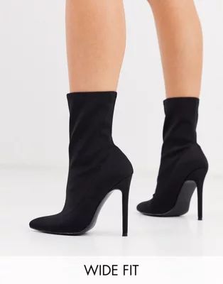 ASOS DESIGN Wide Fit Esmerelda high heeled sock boots in black | ASOS (Global)
