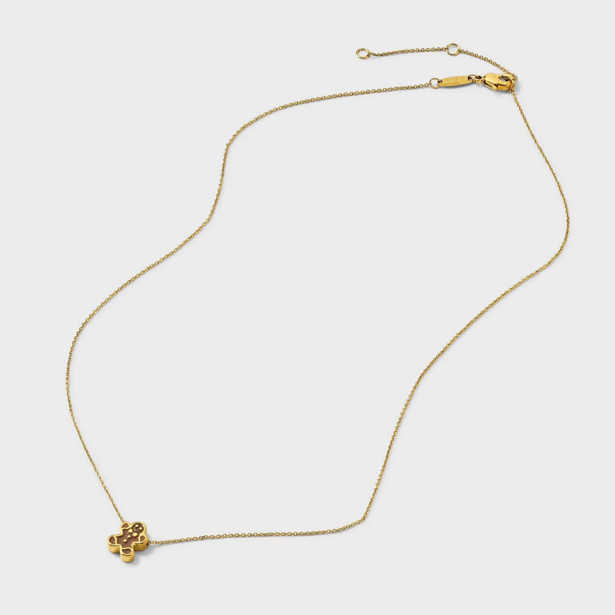 Tiny Tags 14K Gold Ion Plated with Brown Enamel Gingerbread Man Necklace - Gold | Target