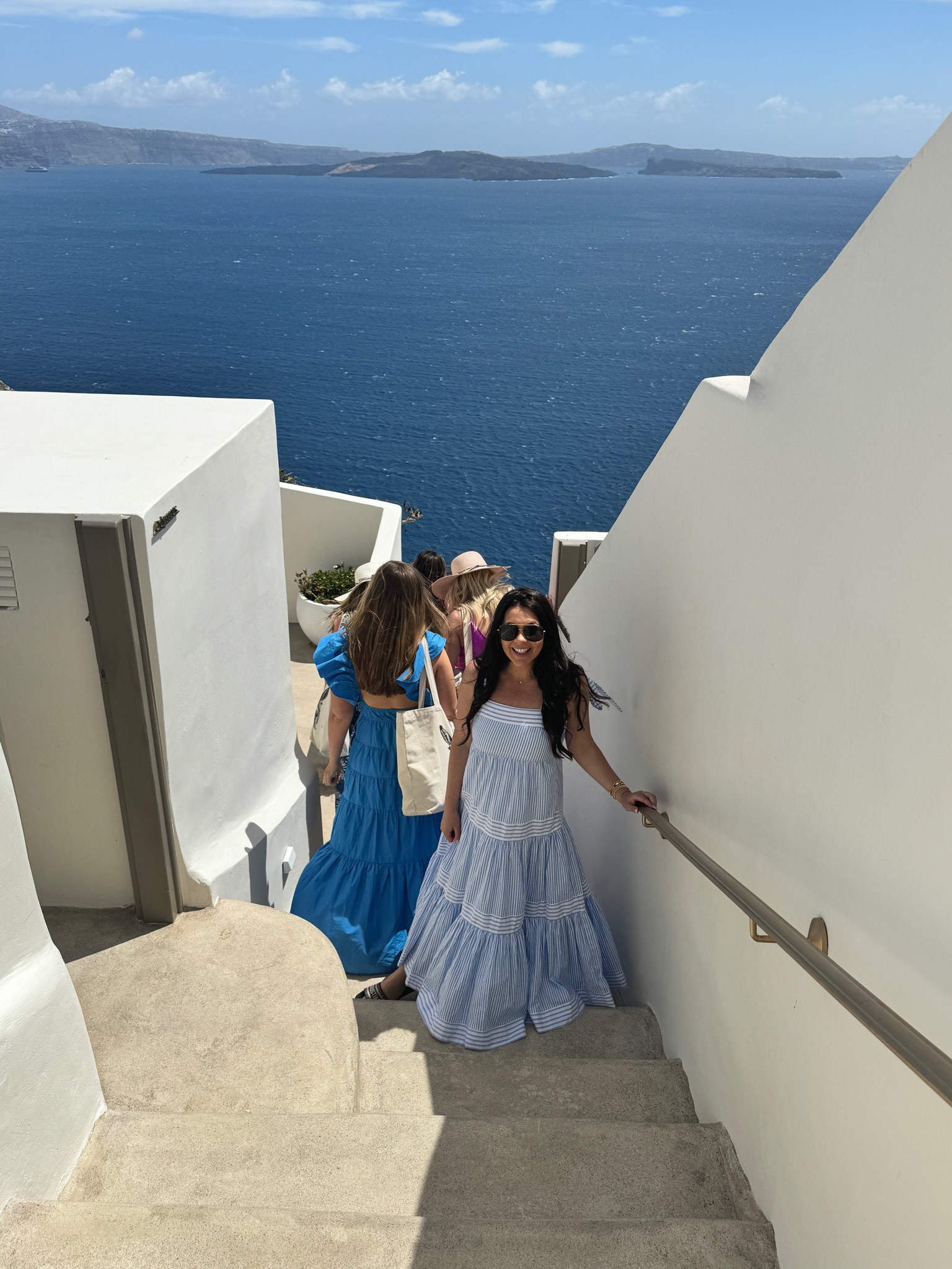 Blue and white striped dress in Greece. 🇬🇷
(This one is sold out but linked similar ones) 

#LTKTravel #LTKSeasonal