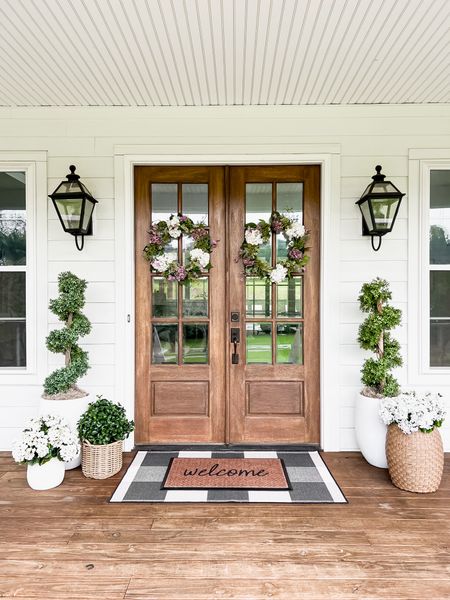 Front porch and front door decor large white planter trending viral home decor pottery barn dupe look a like look for less artificial faux plants trees flowers florals greenery faux geraniums hydrangeas doormat and washable outdoor rug from ruggable layered double modern farmhouse southern porch eucalyptus tree wreath lantern, outdoor light fixtures, wall sconces lighting jute spiral topiary

#LTKstyletip #LTKSeasonal #LTKhome
