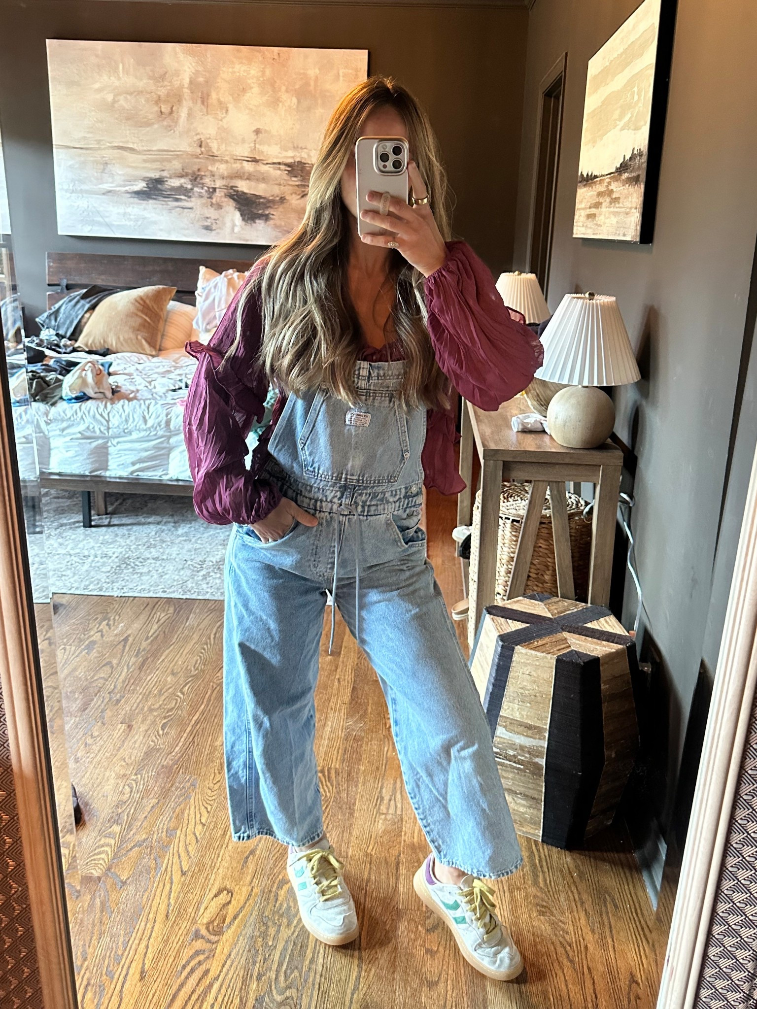 Levi’s overalls! These are the drawstring style! I am wearing an XS. The plum top is on my boutique’s website “the autumn rose top” I am wearing an XS. shoes are Coolway!! 

#LTKFindsUnder50 #LTKSaleAlert #LTKStyleTip