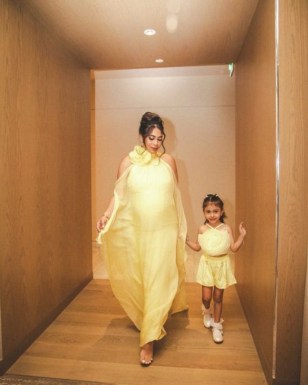 Forever matching with my daughter 💛💐
#mommyandme #bumpstyle #matchingoutfits #sisterofthebride