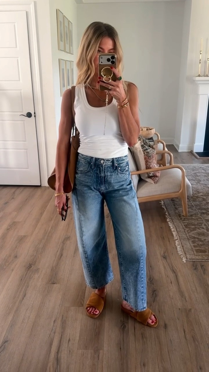 A classic outfit that makes me feel chic whether I have lunch plans or I am just running errands.  White tank runs TTS, wearing an XS long length. Jeans run TTS, wearing a 25. Suede cognac leather slides run TTS

#LTKootd #LTKgrwm #LTKdayinmylife