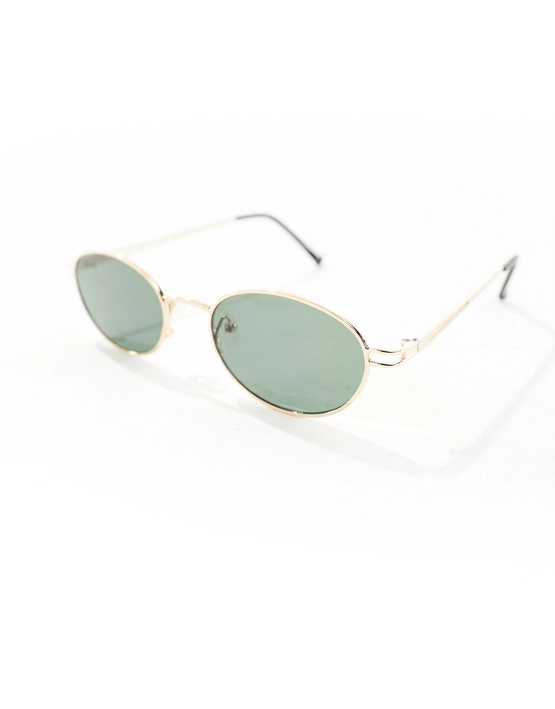 ASOS DESIGN metal oval sunglasses in gold | ASOS (Global)