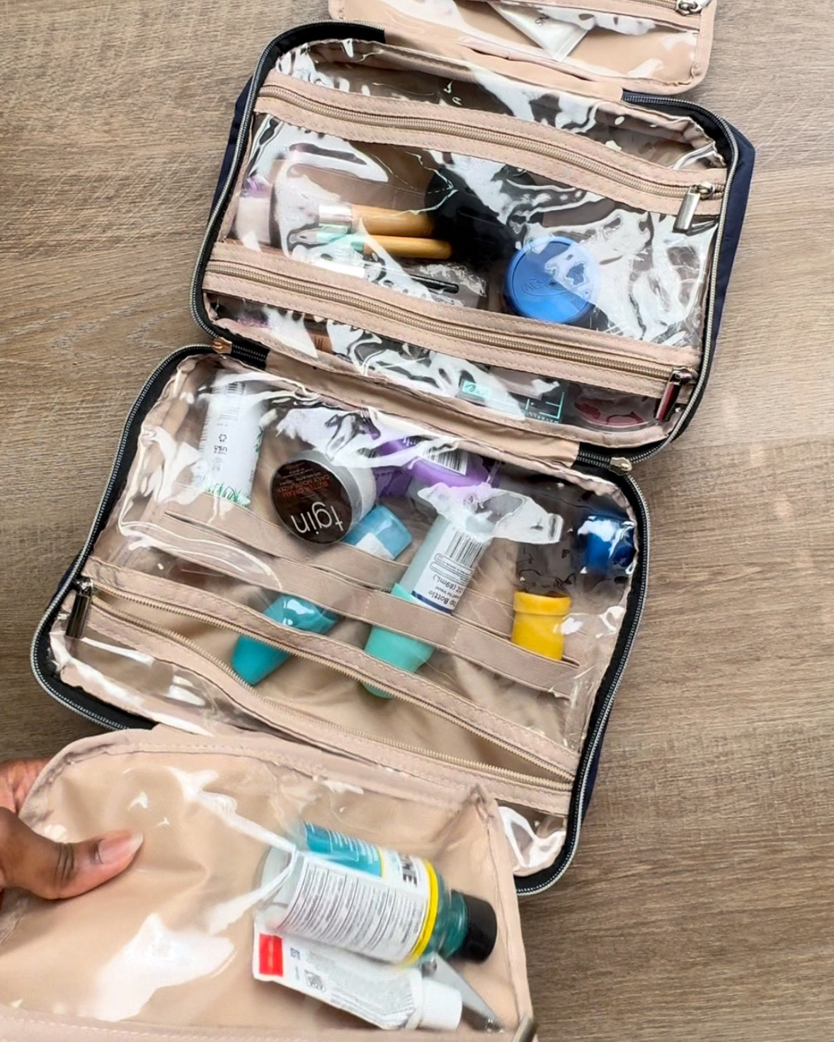 I'm so glad that I bought this toiletry bag. It fits all of my makeup, skincare, and hair care that I travel with so I don't have to use separate bags. 

 #LTKStyleTip #LTKBeauty #LTKTravel