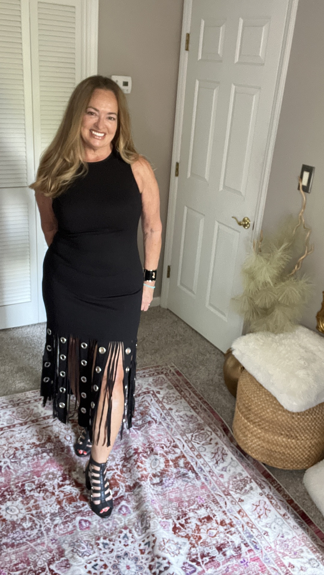 A fun edgy fringe with grommet details on this lbd.

#LTKOver40 #LTKMidsize #LTKootd