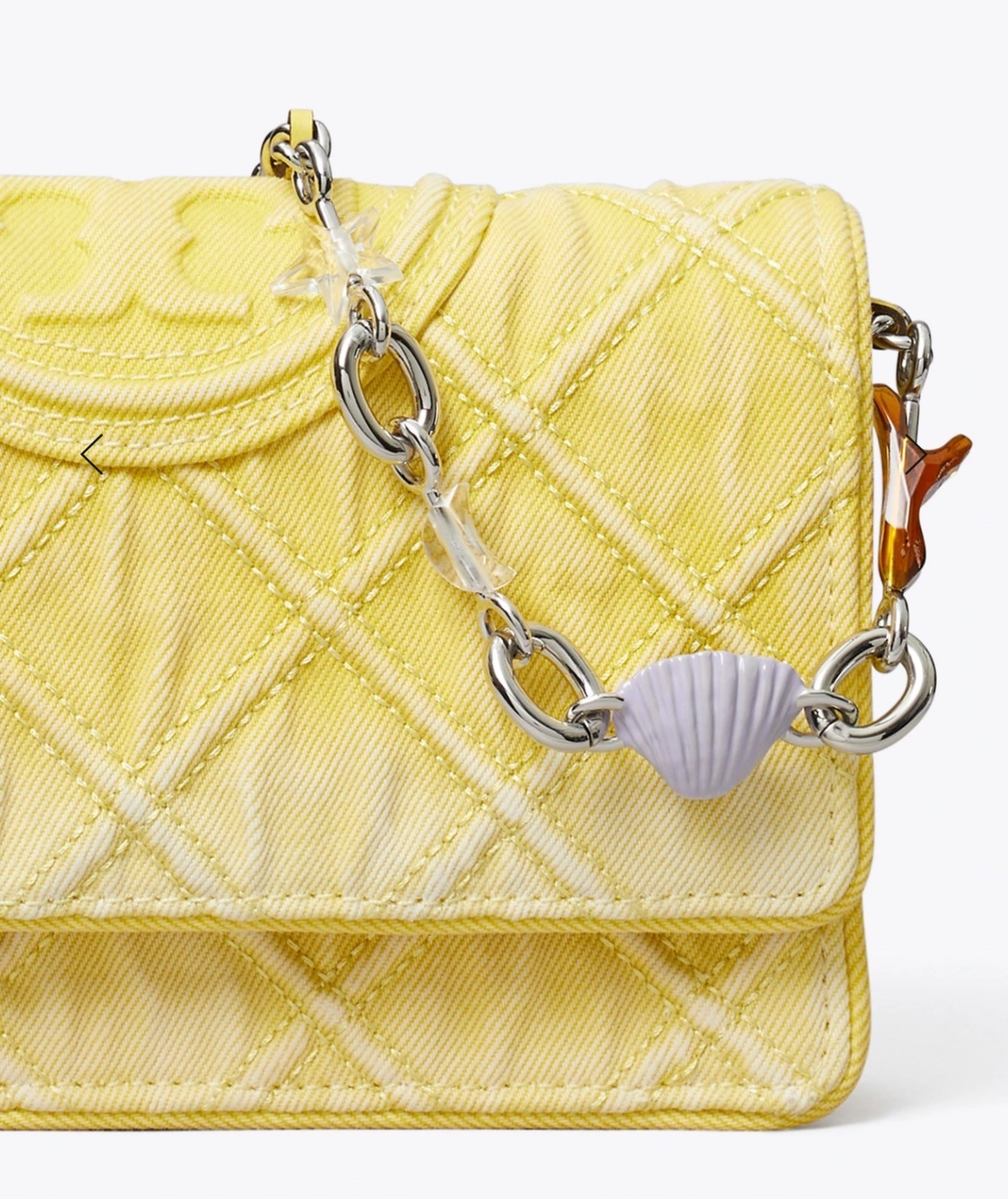 FLEMING DENIM CHARM CHAIN CROSSBODY

The Fleming Chain Crossbody is designed in pigment dyed denim with a subtle degradé effect and diamond quilting. The removable crossbody strap is laced with leather and finished with a star, moon, shell, coral and Double T charm

#LTKspringtrends #LTKWorkwear #LTKootd