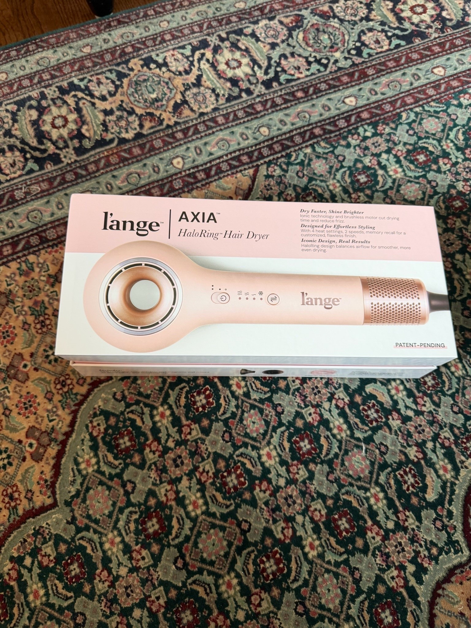 This L’ange Axia HaloRing Hair Dryer is such a good beauty find if you want a lightweight hair dryer that helps with fast drying, frizz control, and a smoother blowout at home. The ionic hair dryer design, brushless motor, 4 heat settings, 2 speeds, cool shot button, and magnetic concentrator make it easy to style your hair without a bulky blow dryer. I also love that this compact hair dryer has a magnetic wall mount, so it’s great for saving counter space and keeping your hair tools organized.

#LTKSeasonal #LTKOver40 #LTKBeauty
