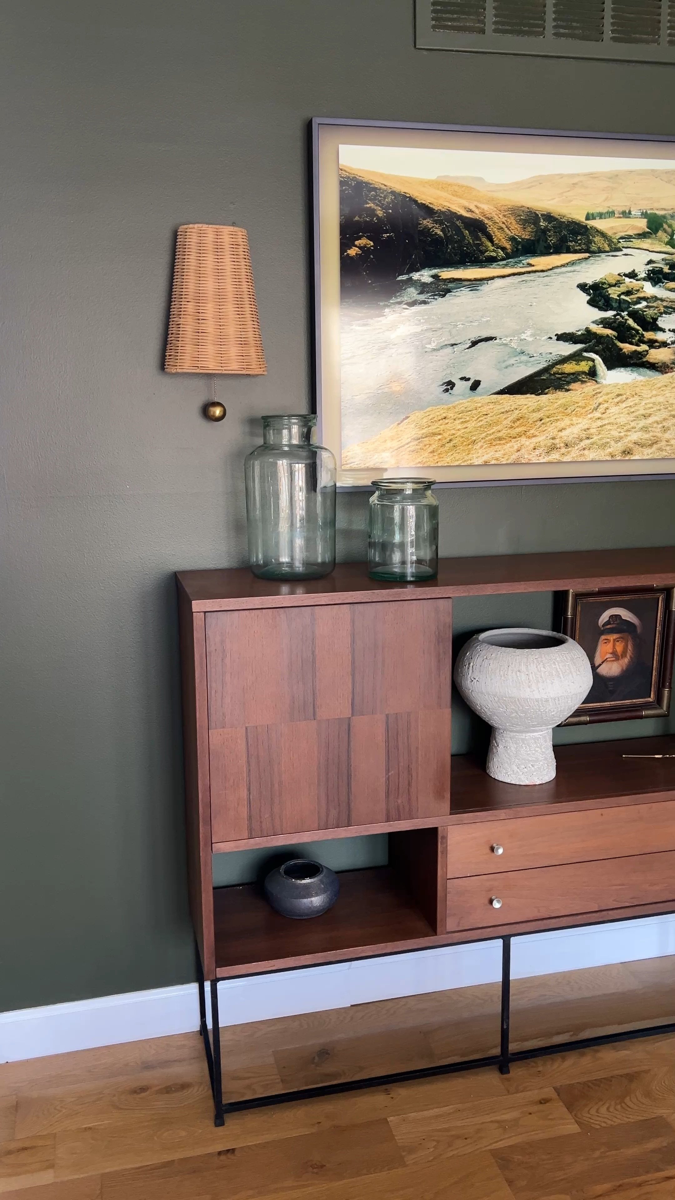 Battery operated lightbulbs in the sconces flanking the tv makes extra lighting so easy. 

#LTKHome #LTKStyleTip #LTKFindsUnder50