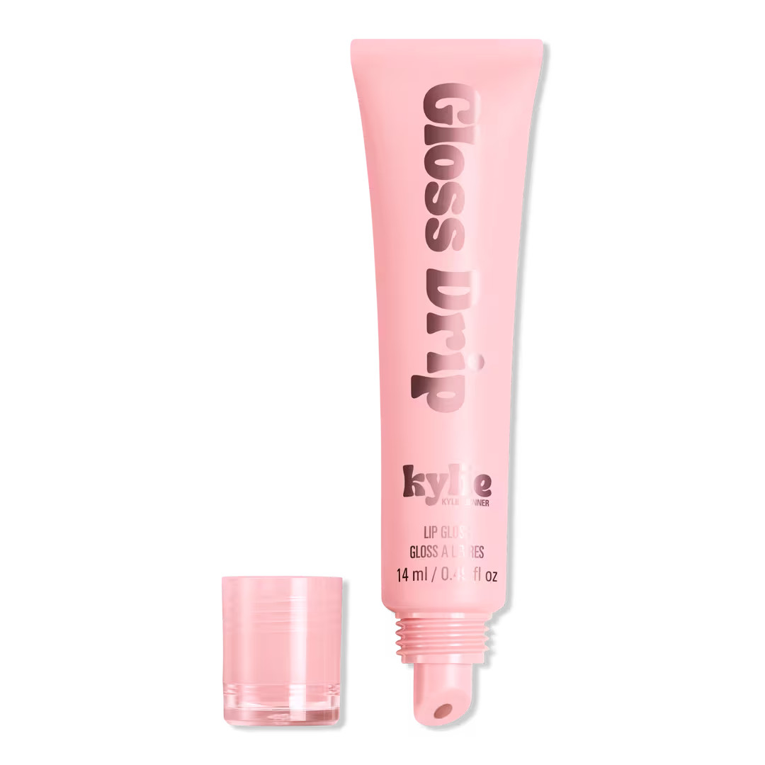 Swipe on the KYLIE COSMETICS juicy Gloss Drip Lip Gloss for a reflective, mirror-shine finish. Th... | Ulta