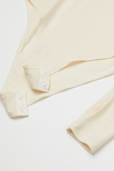Ribbed Turtleneck Bodysuit | H&M (US + CA)