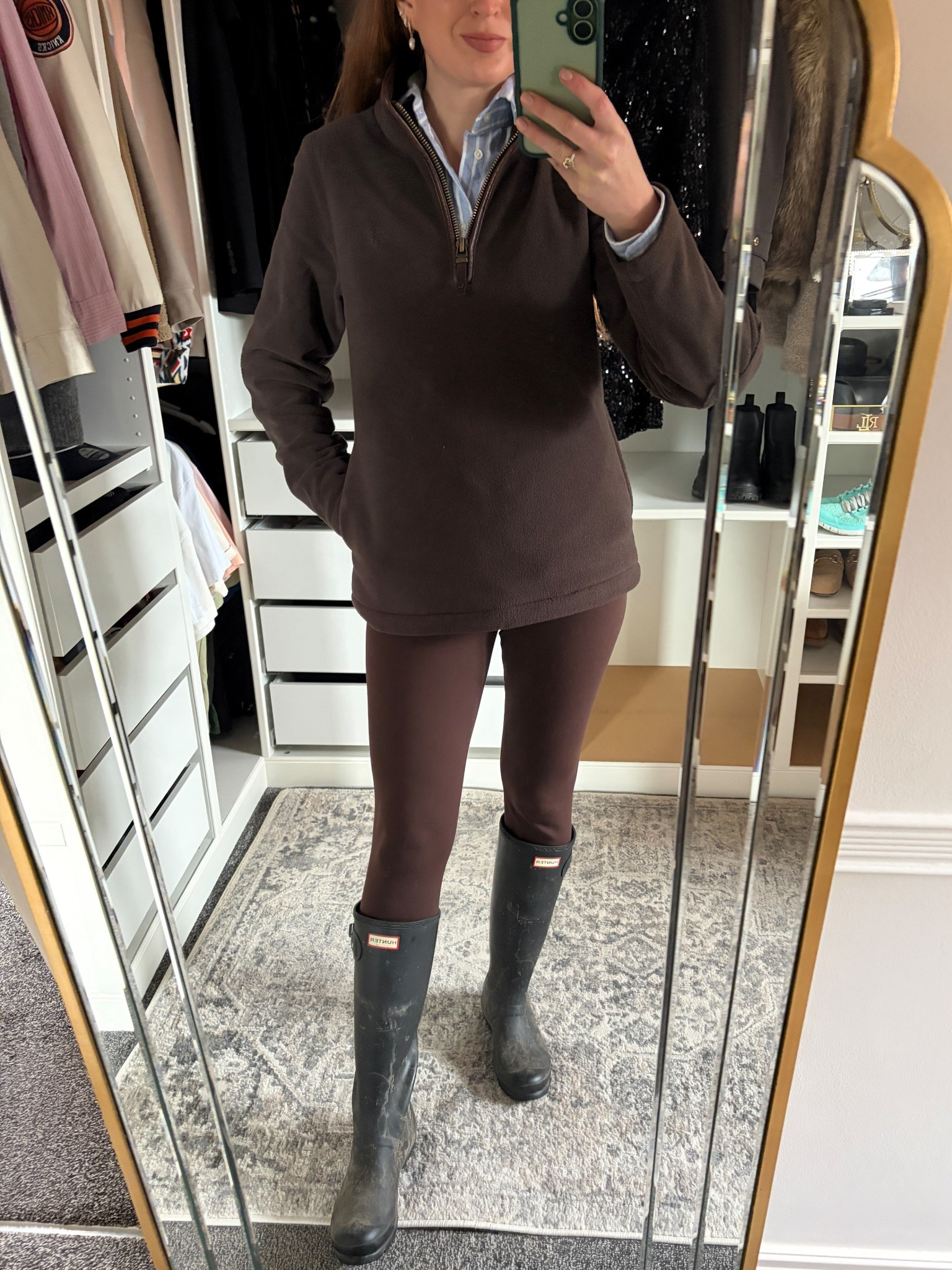 A classic rainy-day look in rich brown tones, half-zip fleece layered over a blue shirt, streamlined leggings, and timeless Hunter boots. Practical, polished, and effortlessly country-chic.

#LTKuk #LTKluxury #LTKwinter