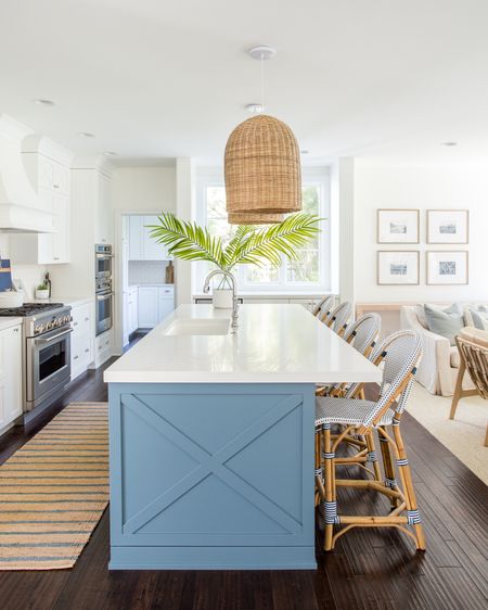*Many of these items are currently on sale* Our Omaha kitchen decorated for summer! I can’t get enough of this blue striped jute rug and oversized faux palm leaves paired with our basket pendant lights and bistro counter stools!

. coastal kitchen design. Light kitchen decor, blue and white decor, beach vibes

#ltkhome #ltksalealert #ltkseasonal #ltkfindsunder50 #ltkfindsunder100 #ltkstyletip

#LTKhome #LTKsalealert #LTKSeasonal