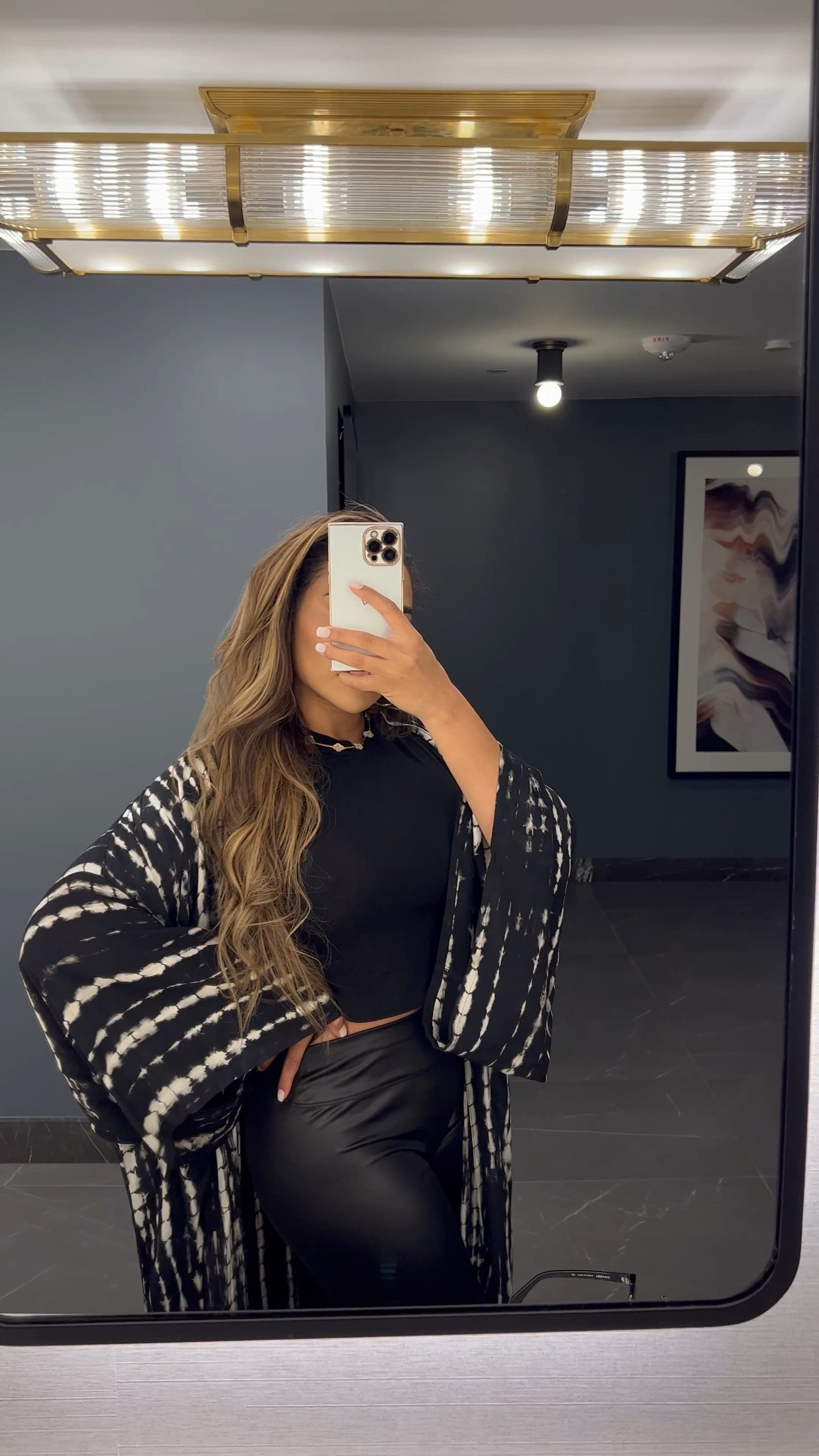 Revolve All Black Date Night Outfit 
Kimono, turtleneck crop top, leather leggings 

#LTKFind #LTKstyletip