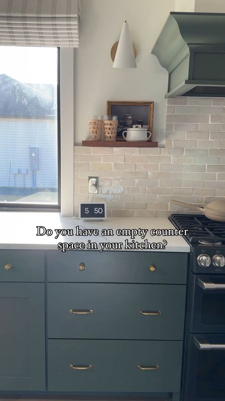 Do you have an empty counter space in your kitchen? Let’s fix it!

I love adding various size cutting boards, cookbooks, the cutest Amazon olive tree, and more to create depth and texture in our green kitchen. 

I also created a moment next to our range with a wood pedestal, ceramic utensil holder, and you can’t forget the Google (or Alexa) for dinner time music.

Follow me @frengpartyof6 for all things neutral home!

#affordablehomedecor #boujeeonabudget 
#organicmodern #kitchen #kitchendesign #cottagestylehome #homeideas #ltkhome 


#LTKhome #LTKstyletip #LTKfindsunder50