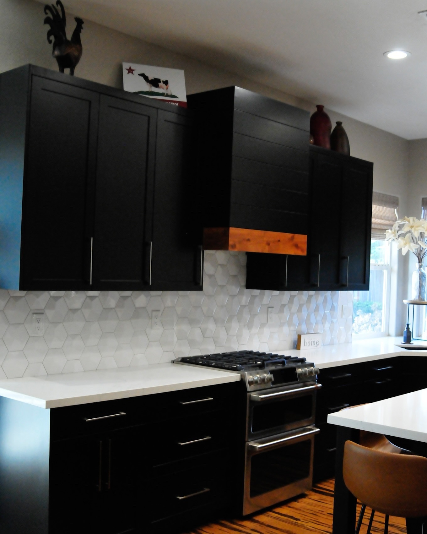 A kitchen just screaming for  festivities. My client’s story was unique, as her project started because of an unfortunate dishwasher leak, wreaking havoc on her bamboo floors, and lower cabinets.

It was the perfect opportunity to change things up in her kitchen. Including, moving the location of her sliding glass door, and gaining a much larger door! Also increasing island space, extending the kitchen, moving dishwasher and oven placement, and cement and stucco work outside. Her wish was to save her floors, and gaining more countertop space. And that is what we did! Successful remodel!🖤

#kitchen #kitchendesign #kitchenremodel #kitchendecor #kbis #kitchenrenovation #dishwasherleak #checkyourdishwasher #quartz #quartzcountertops #blackcabinets #kraus #blanco #polyandbark #valleyinteriors