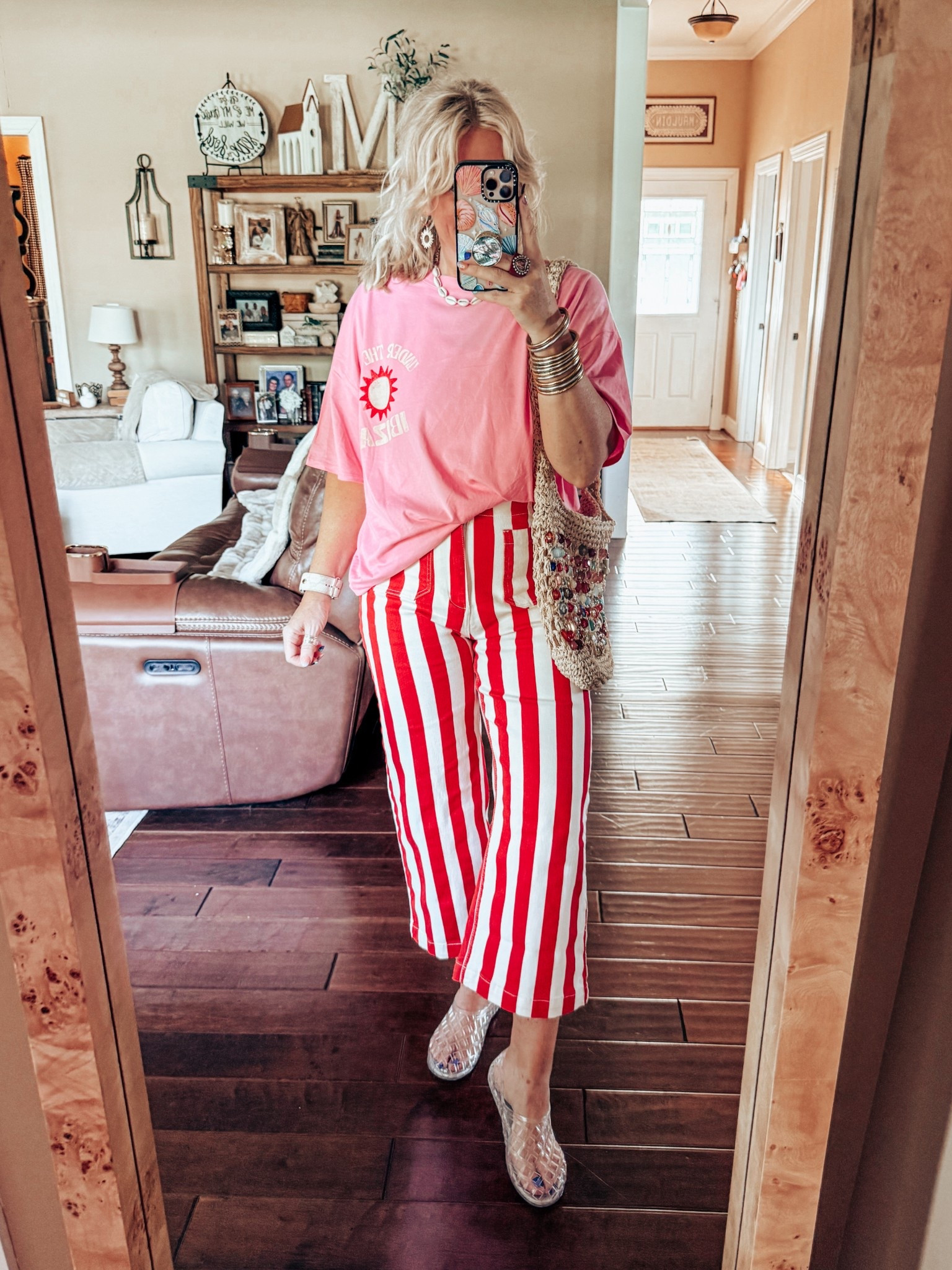 This 🎯graphic tee is so fun for summer and it’s adorable with these striped jeans. 
Tee - L
Striped jeans - size 8  
Jelly shoes - true to size 
Earrings are @blueyedhorse save with code MANDIESAVE10 

#LTKFindsUnder50 #LTKStyleTip #LTKOver40