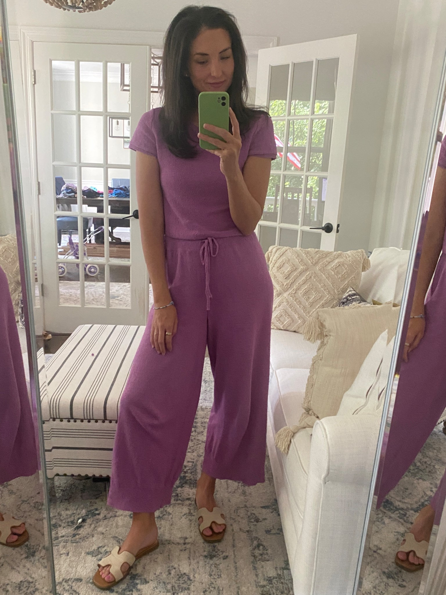 One of my go to sets! Love this vibrant purple matching sweater set. It’s light weight and perfect for working from home in the summer. I’m wearing a small, the set runs a little big. Very limited sizes still available in this two piece set but I linked several other really cute sweater sets for summer. These target sandals are perfect for me! I can’t buy expensive sandals because I’m so dang hard on shoes but these are great and go with everything! Wearing a size 10 fit true to size. Also, I can’t go a day without my Oura ring. Linked it as we’ll 

#LTKFindsUnder100 #LTKShoeCrush #LTKSummerEdit