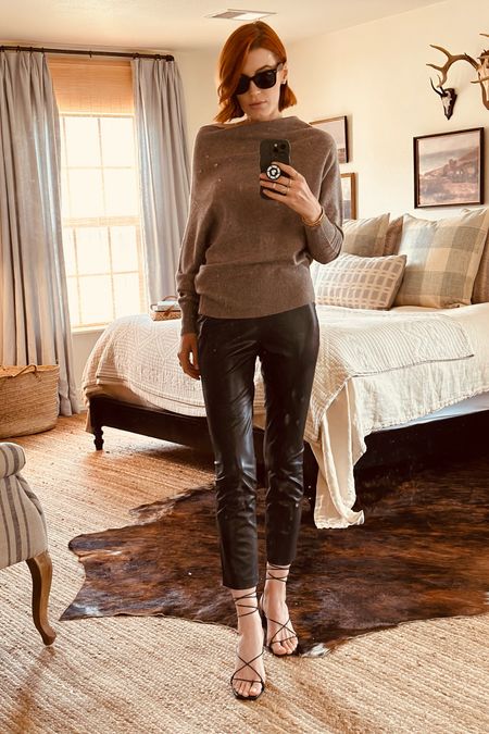 One of the most versatile fall looks I own. This top works so well for video calls and is also perfect for a night out. 
These pants are a modern cut- high waist, ankle cut and not skinny but slim leg. They are not too tight and the ankle cut makes them new. 
Grab these year-round sandals for jeans and pants like this. 

#LTKworkwear #LTKtravel #LTKSeasonal