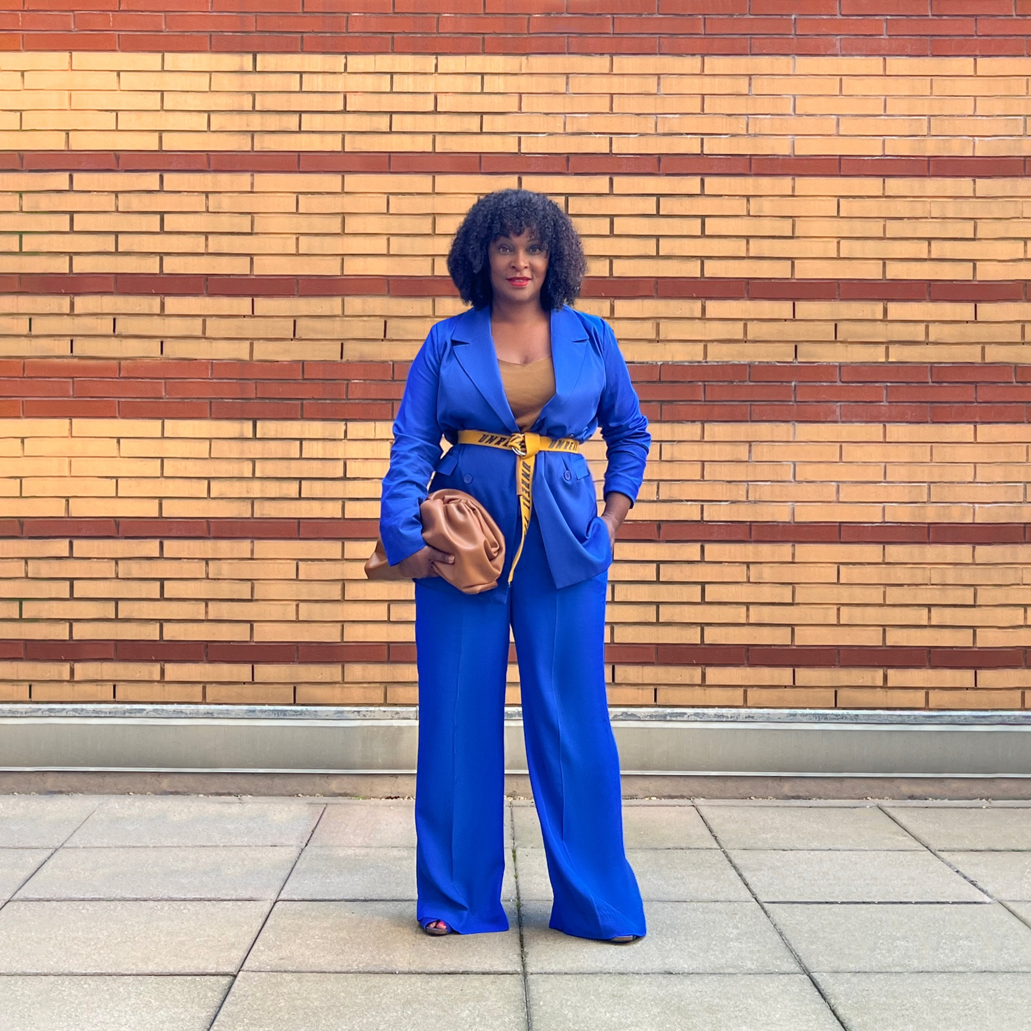 Breathing new life into a blazer is hard! But there's a two-second style hack you can try that's not only refreshing but flattering, too.  
 
With the cooling temps of fall right around the corner, lasso in all your layers with a belt. The look is polished and figure-defining.

#LTKitbag #LTKshoecrush #LTKstyletip