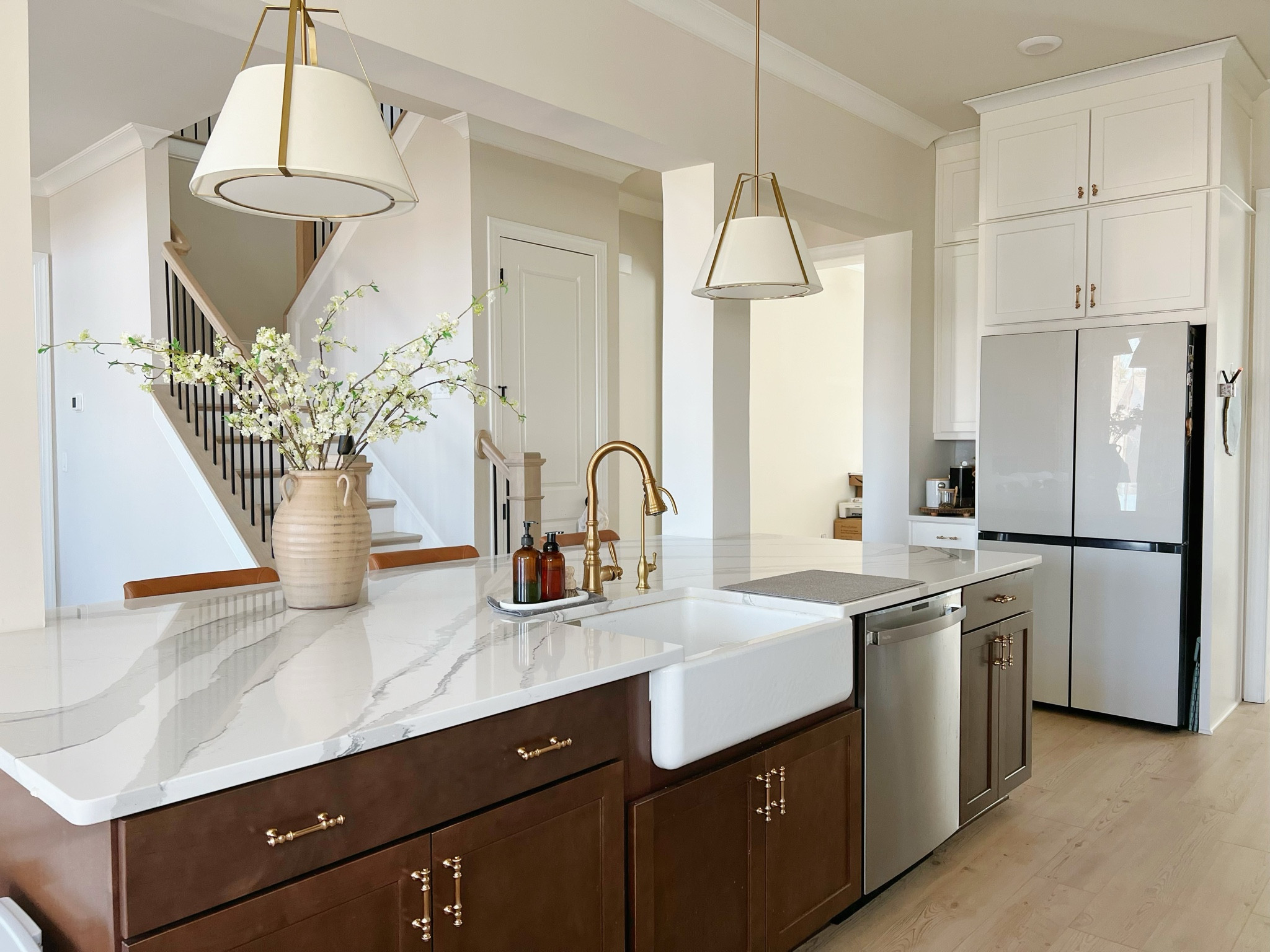 Spring for my transitional kitchen. The key is the oversized vase and spring florals. And of course the matching pendant lights.

#LTKhome
