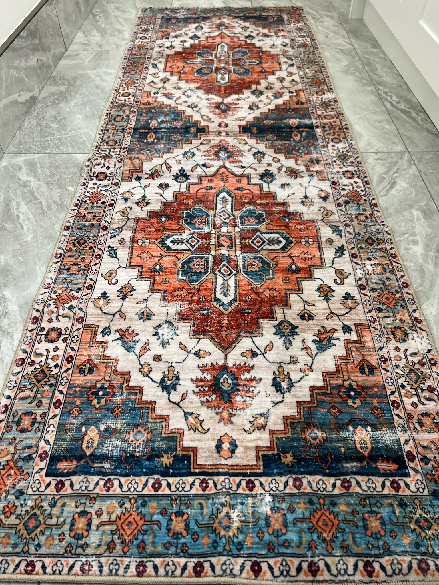 The one rule for a carpet in the bathroom is it must be washable.

#LTKhome