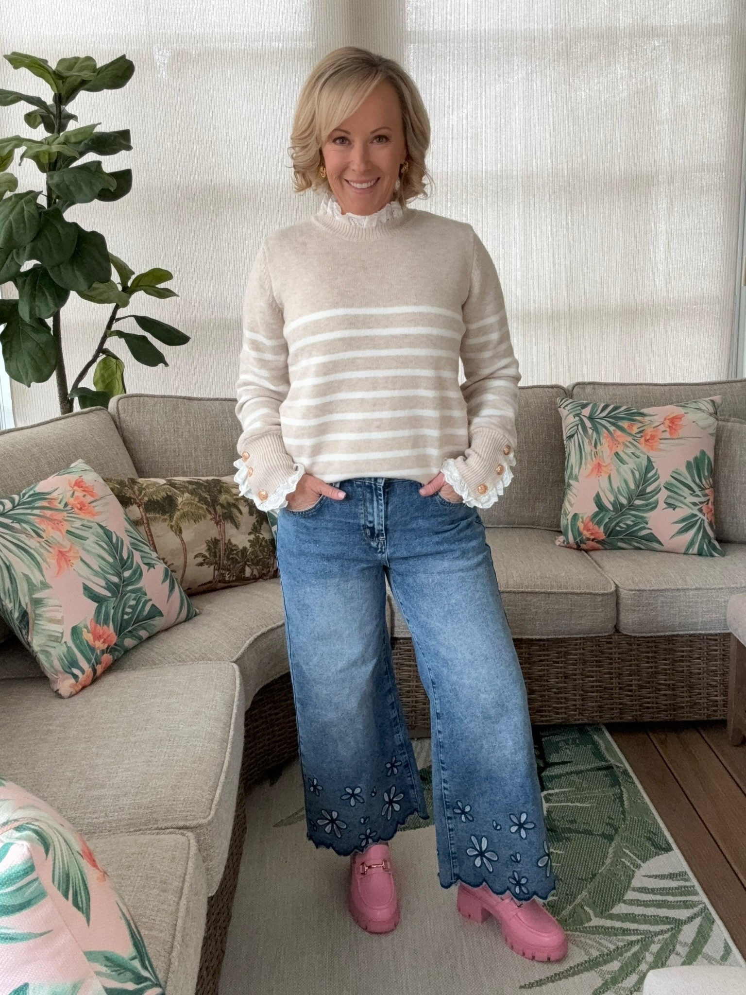 Loving this look that’s chic, easy to put together, and that you would never believe is all from Amazon! This turtleneck striped sweater has the cutest ruffle detail, gold buttons, and is really great quality - it’s one of those pieces that instantly elevates any outfit. I paired it with these wide-leg embroidered jeans that are great for spring days ahead and my chunky pink loafers for a fun pop of color. I finished it off with my favorite gold staple earrings that go with every outfit! Shop my look! 

#LTKootd #LTKPetite #LTKgrwm