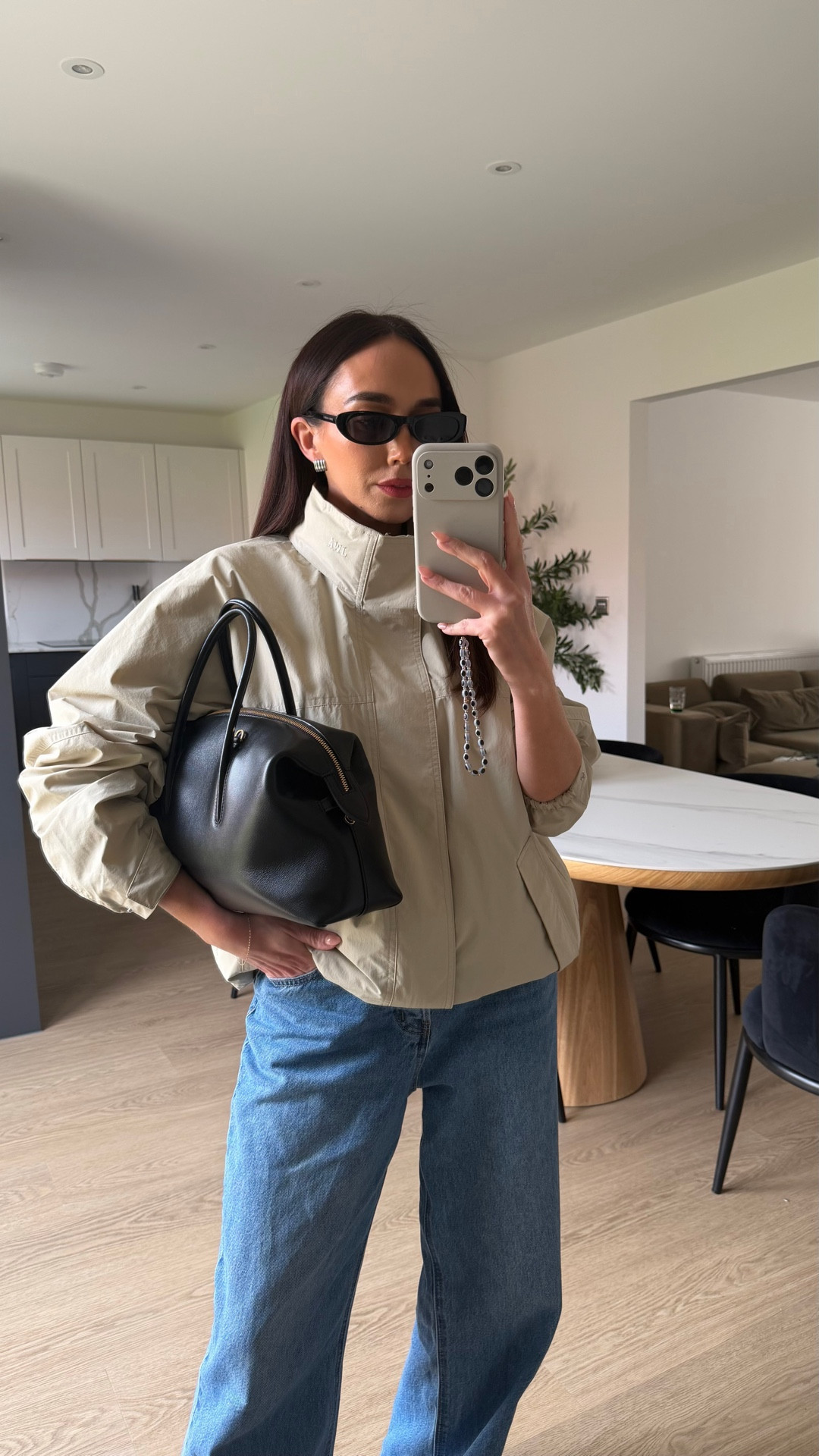 Spring outfits consist of funnel neck jackets light wash denim and sunglasses on rotation 



#LTKspring #LTKjeans #LTKstyletip