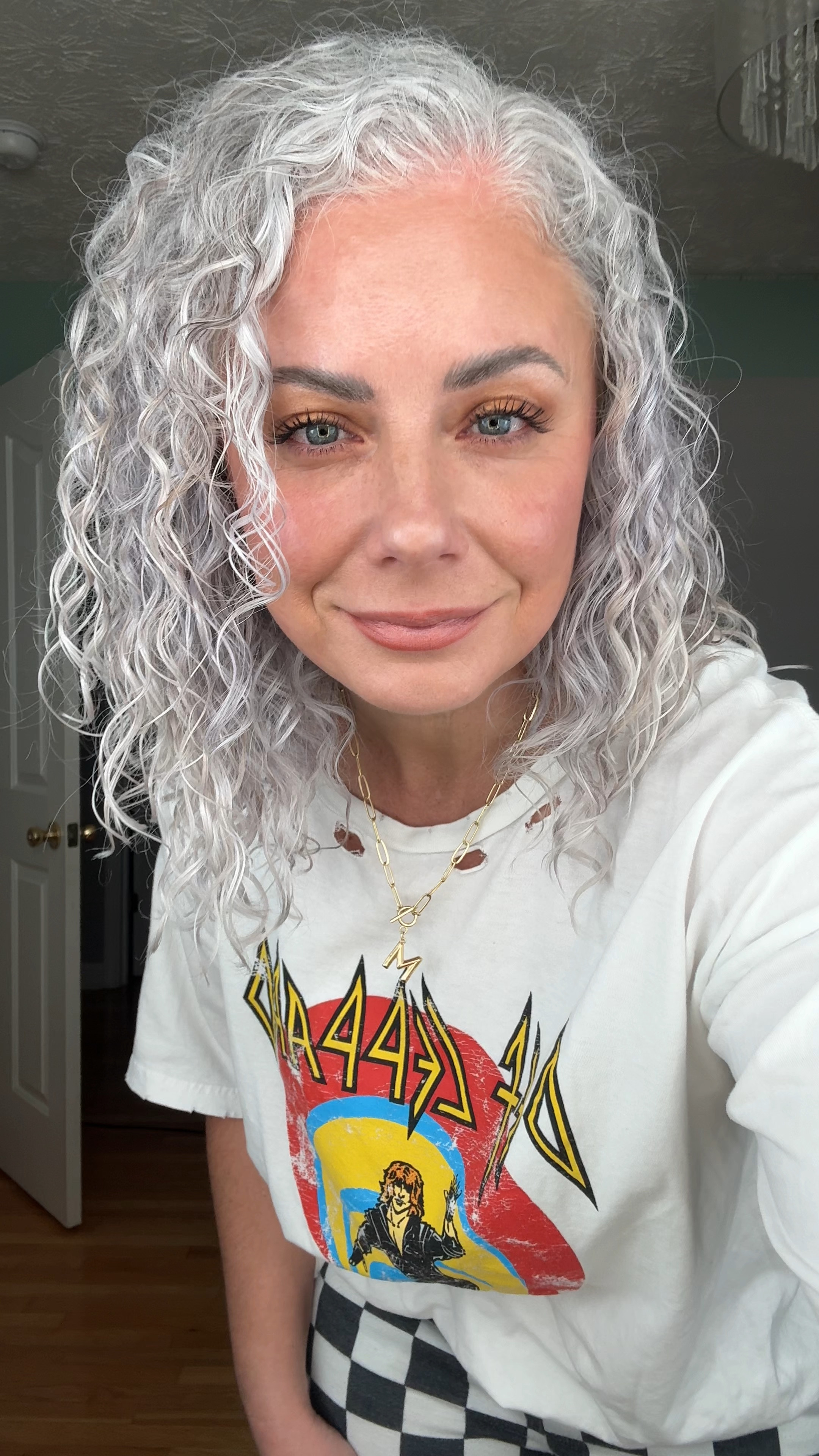 Bringing vintage rock vibes with a touch of comic flair! Who said budget-friendly can’t be bold and stylish? ⚡️✨ #RockChic #BudgetStyle #AmazonFinds #EffortlessFashion #DefLeppardVibes #CheckeredTrend #CozyAndCool #StyleOnABudget