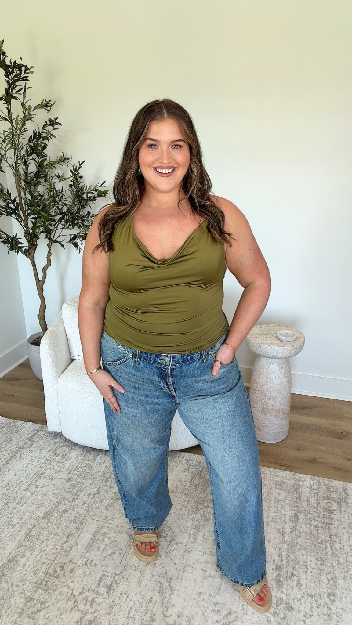 🎯 edition buy or bye 👋🏼 
This green top is stunning! Love the stretchy material and gold halter detail. Paired with low rise denim which I never thought I’d like let alone LOVE! Wearing a size XXL and 18
This outfit is a BUY 🛍️

#LTKootd #LTKPlusSize #LTKSeasonal