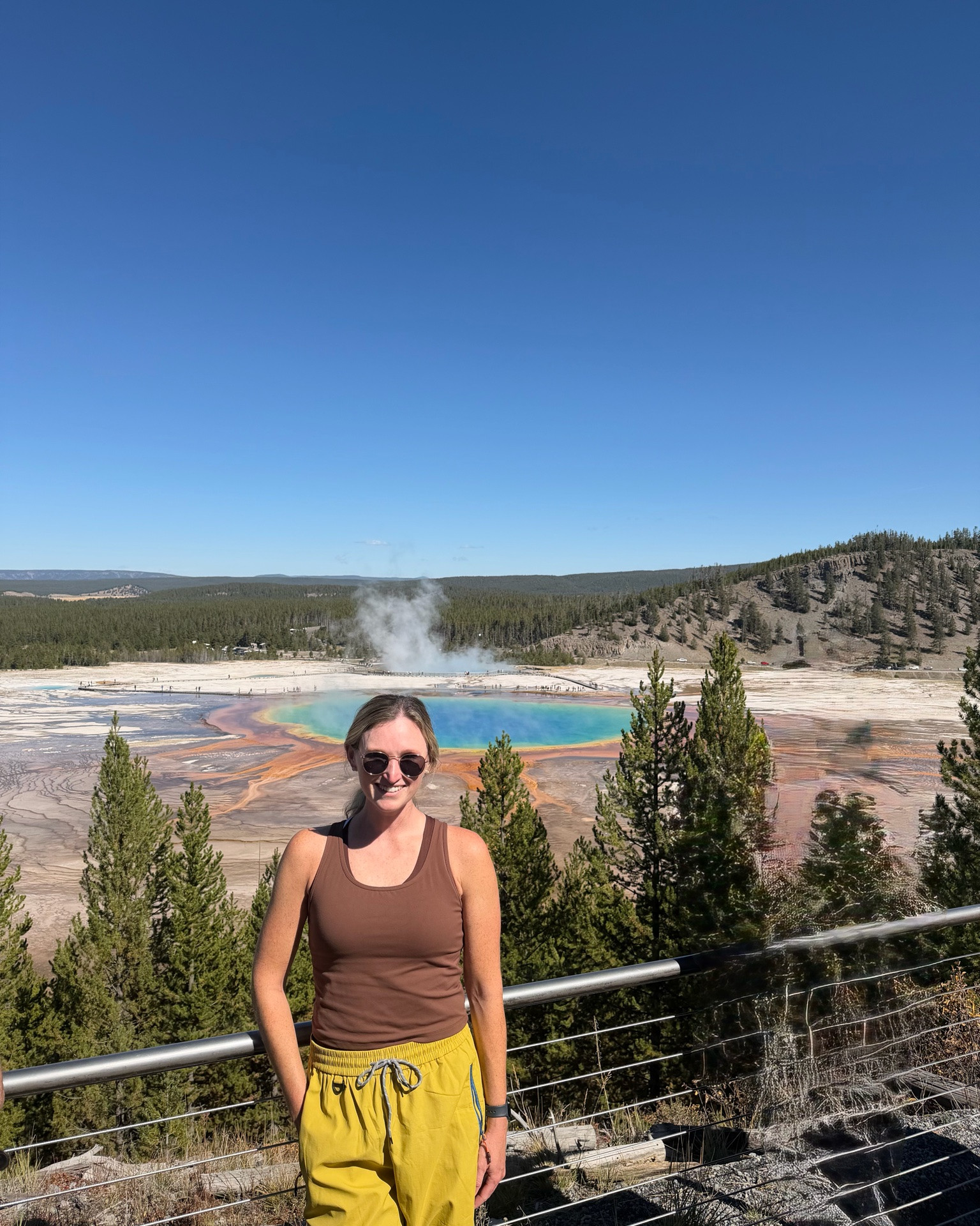 Yellowstone Fall hiking outfit. Free people dupe parachute pants (size up L) with brown long sleeve top, brown crop tank (size up L), supportive brown sports bra, medium size hiking backpack and comfortable hiking boots

#LTKTall #LTKActive #LTKTravel