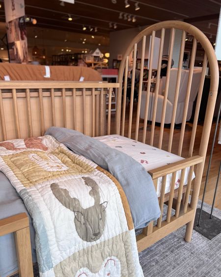 This is a blonde/natural colored spindle wood convertible baby crib and I like the rounded detailing. It’s convertible so it transitions into the next phase of your toddler’s room. 

#LTKBaby #LTKHome #LTKKids