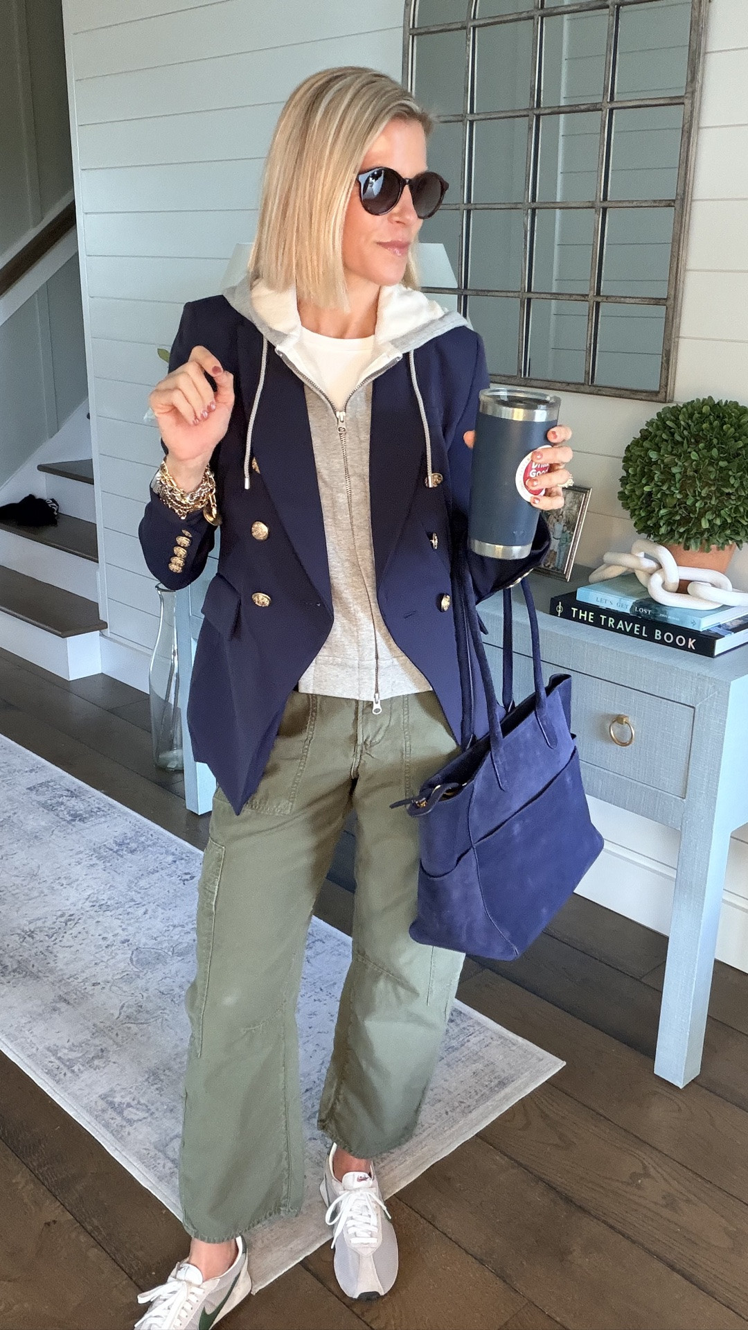 This stylish classic blazer is stunning. The attached inserts allow the blazer to do double duty with different looks. The gold buttons pop and it can be paired with everything. Add the blue suede bag and you have the perfect pieces to take you into fall. #quincepartner @Quince

#LTKmomlife #LTKOver40 #LTKWorkwear