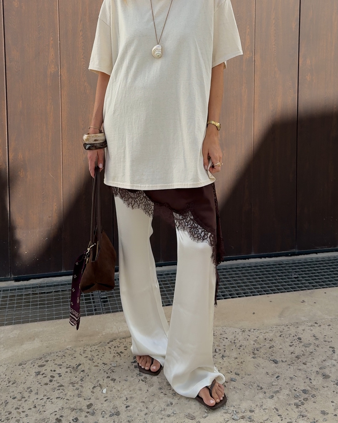 Late summer layering • wearing a silk white pants with a lace asymmetrical top and an oversized beige shirt #lacerop #laceshirt #oversized

#LTKdeutschland #LTKstyletip #LTKeurope
