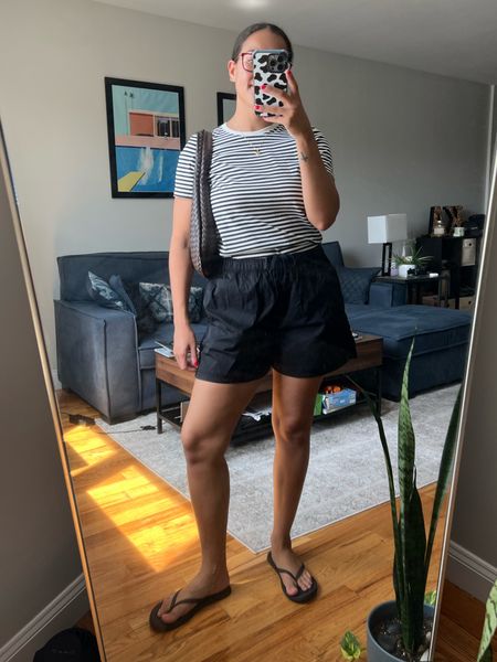 A big trend I’m seeing in stores for fall is a simple striped t-shirt! I have always loved stripes because they are a simple way to elevate an otherwise plain t-shirt. I paired them back to my black cotton twill shorts that I wear religiously in the summer and a simple pair of flip flops.

#LTKstyletip #LTKSeasonal