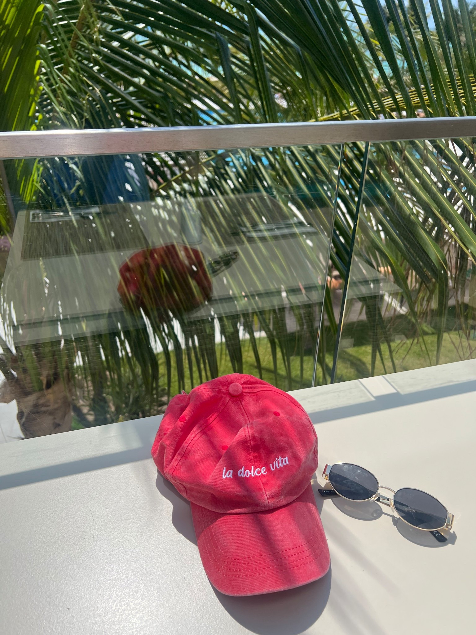 La dolce vita red baseball cap hat and Amazon sunglasses 
