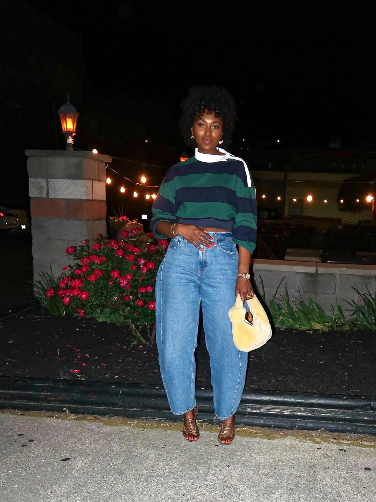 Wearing a large in the top and 31 in the jeans