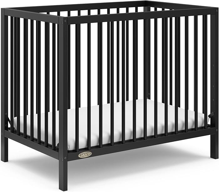 Graco Teddi 4-in-1 Convertible Mini Crib with Bonus Water-Resistant Mattress (Black) – GREENGUA... | Amazon (US)