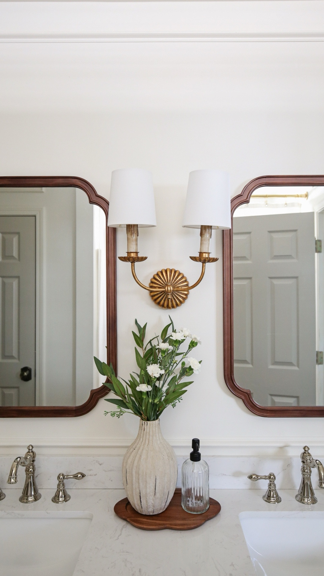 Brass double wall sconce with linen shades 

#LTKHome #LTKStyleTip #LTKSaleAlert