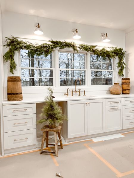 Slowly decorating our new home for Christmas!! We will officially be in there in a couple weeks and I can’t even begin to tell you guys how excited we are. 😭 We shared some of our collection in the picture with Antique Farmhouse and I am in LOVE. 

Christmas kitchen, white kitchen, Christmas decor, vintage Christmas, farmhouse Christmas, antique farmhouse, faux long needle trees, gold accents, Deb and Danelle

#LTKHoliday #LTKSeasonal #LTKhome