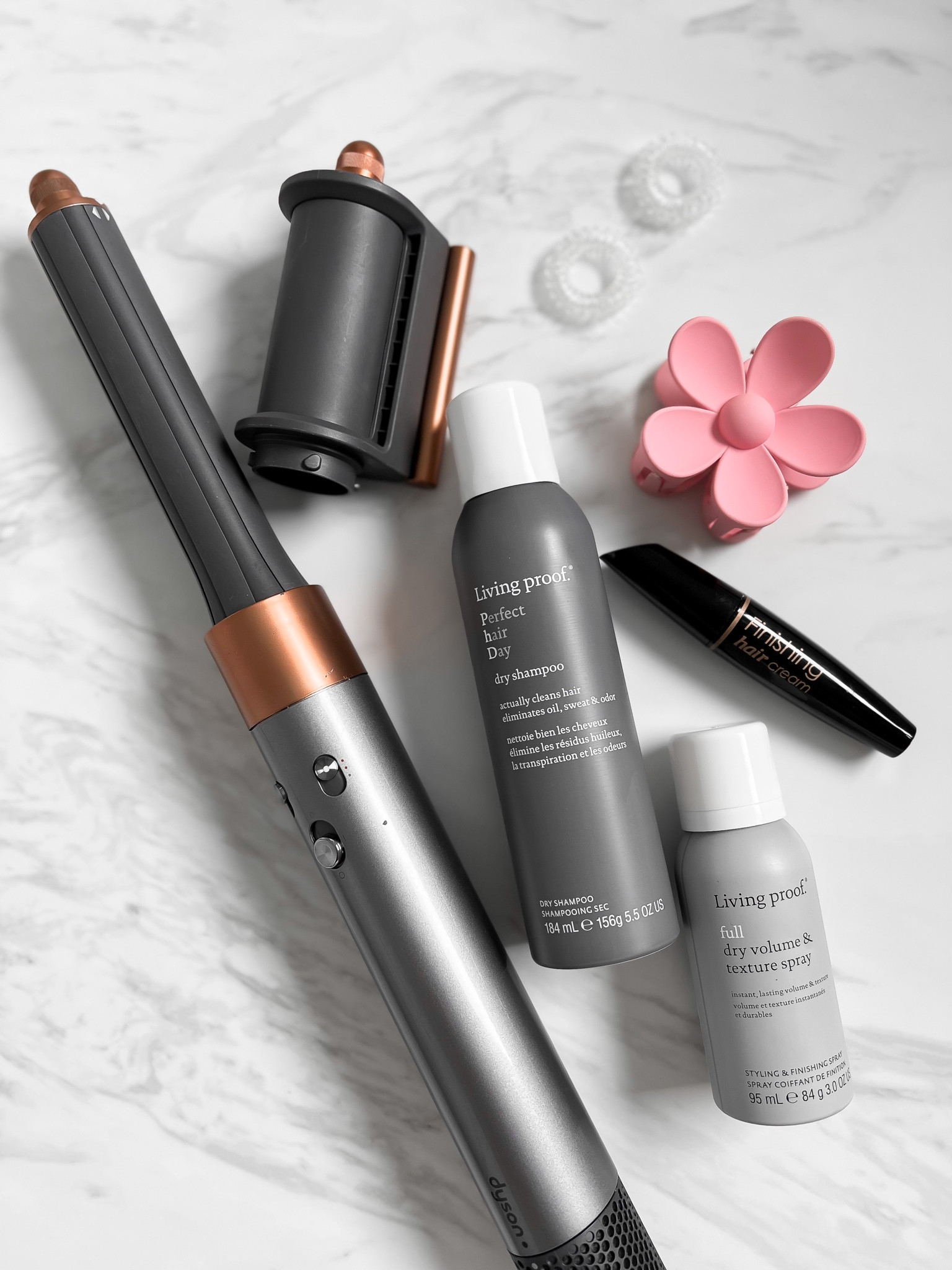 Hospital bag: hair tools, dry shampoo, claw clip, hair tie.  

#LTKbaby #LTKbeauty #LTKbump