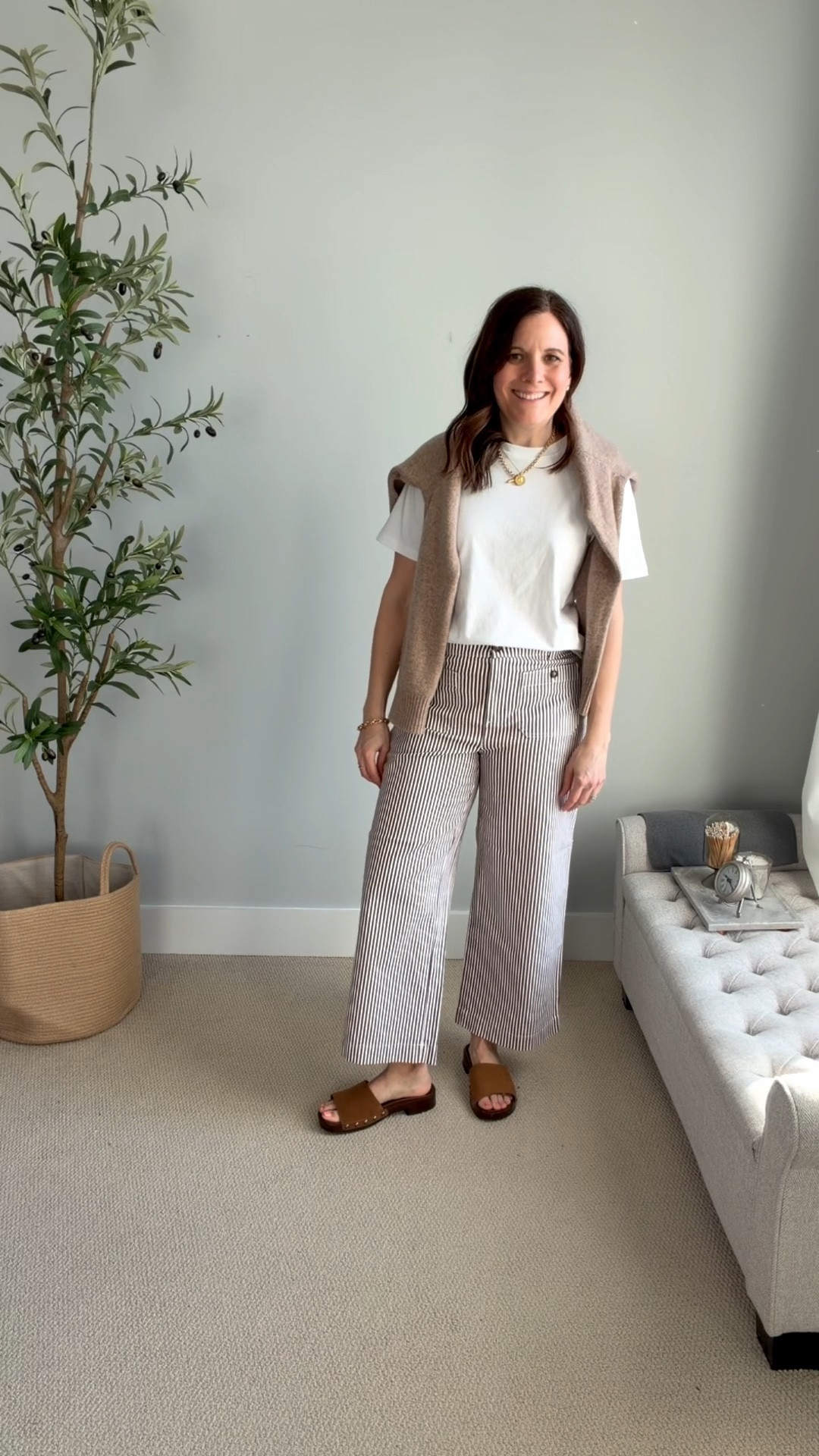 Last spring, my striped wide leg cropped pants were some of my favorites. So when I saw these LOFT brown striped pants, I had to try them. They’re stretchy, comfy, and so cute and would be great for everything from work to a casual Easter lunch. I tried my true size and a size down and decided on my true size. I went down a half size in these @target slides since they fit big. 

#LTKMidsize #LTKOver40 #LTKSaleAlert