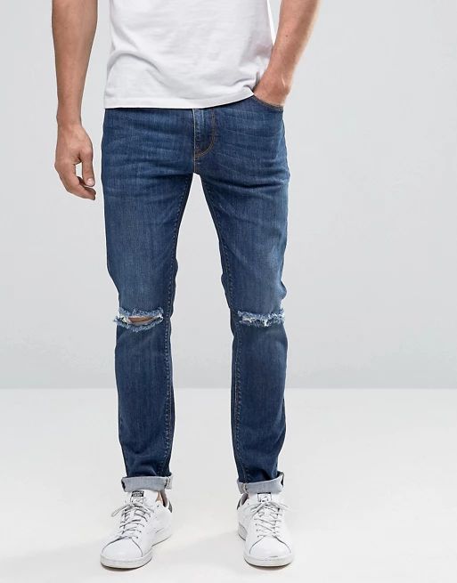 ASOS – Skinny-Jeans in dunkelblauer Waschung mit Zierrissen an den Knien | Asos DE